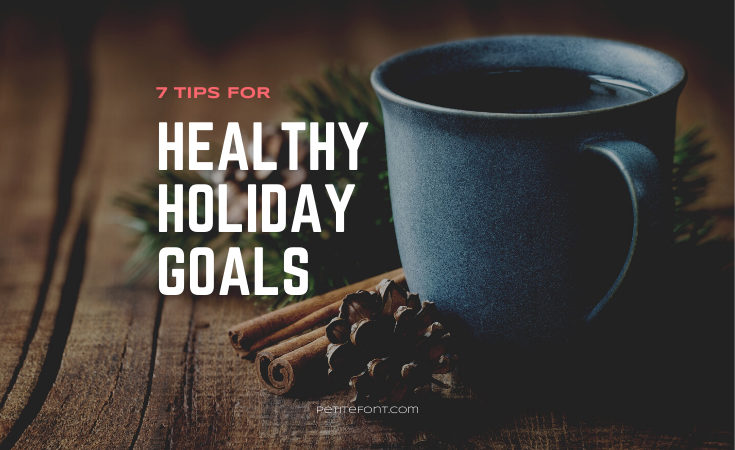 Image of a coffee cup with a cinnamon stick and acorn on table next to it. Text overlay reads 7 Tips for Healthy Holiday Goals, petite font dot com