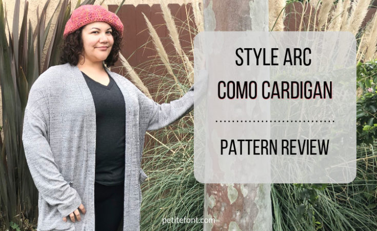 Como cardigan modeled from front on woman with one hand on a tree and text overlay Style Arc Como Cardigan Pattern Review