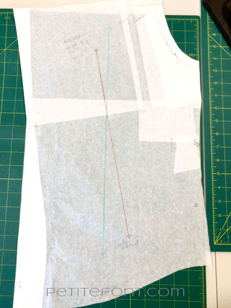 Back bodice pattern piece with 2 grainlines, one in red and one in blue colored pencil