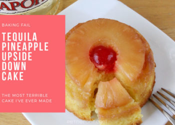 Horizontal image of tequila bottle next to a white plate holding a pineapple upside down cake with a cherry on top and fork to the side, white text in pink box reads Baking fail, tequila upside down cake, the most terrible cake I've ever made