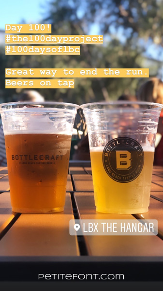 Image of two beers on a wooden table, text reads Day 100! hashtag the 100 day project hashtag 100 days of lbc. Great way to end the run. Beers on tap. LBX The Hangar.Petite font dot com