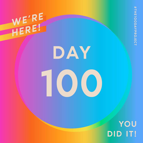 Rainbow with blue circle in middle. Text overlay reads We're here! Day 100. You did it!