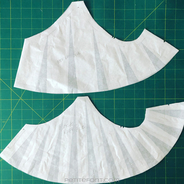 Comparison of two slash and spread ruffle pattern pieces, one with larger sections and less spread and another with smaller sections and more spread