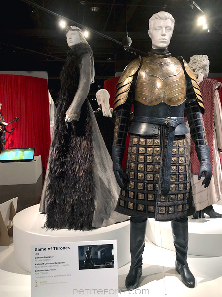 Mannequins modeling Sansa Stark's and Ser Brienne's outfits in the Game of Thrones costumes exhibition at FIDM Museum