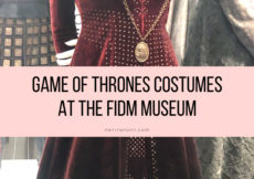 Enlarged image of several medieval costumes with text overlay that reads Game of Thrones Costumes at the FIDM Museum petite font.com