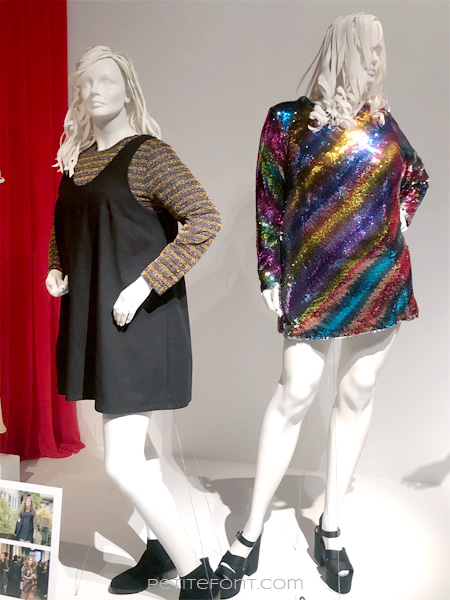 2 mannequins wearing clothes from Shrill which are clearly too large for them, making a mockery of the large actress who stars in the show, from FIDM's 13th Art of Television Costume Design exhibit