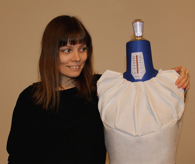 Blogger Minna posing with her arm around a dressmaker mannequin