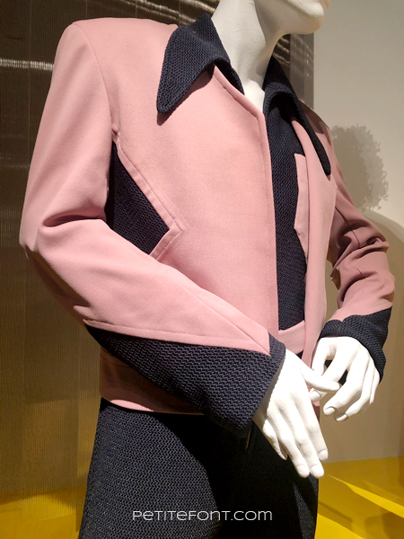 Close up of Wesley Snipes pink and black costume from My Name is Dolomite, at the 2020 movie costumes exhibit at FIDM