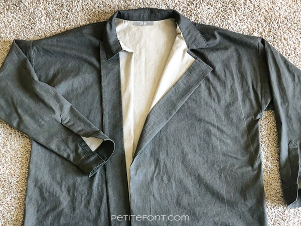 Flat lay of a grey shirt with beige insides showing the Ilford Jacket facing hack fail