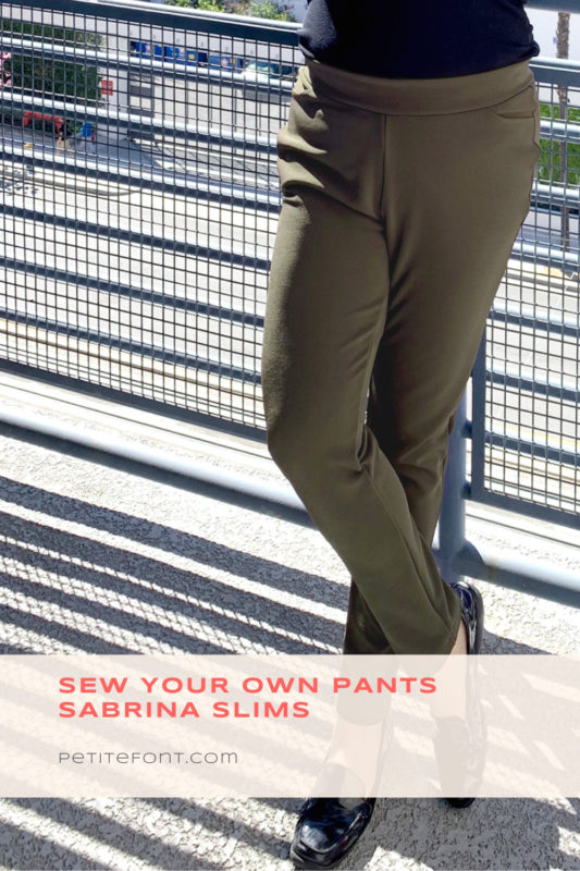 Olive green pants on a person leaning against a blue railing with text overlay that reads Sew Your Own Sabrina Slims, PetiteFont.com