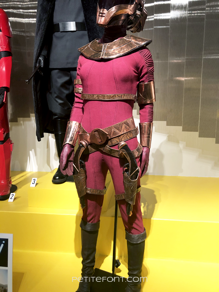 Red Zorii Bliss jumpsuit from Star Wars display at the 2020 movie costume exhibit at FIDM
