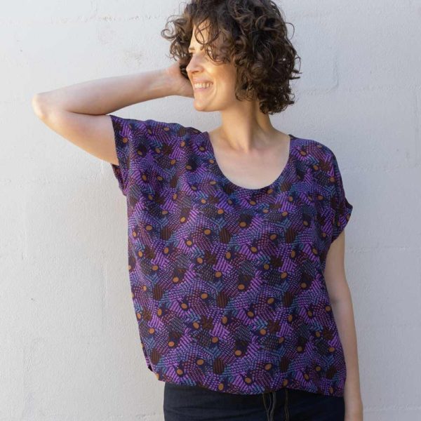 Beth in an abstract purple printed Lou Box Top