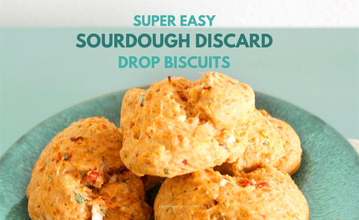 Trio of 3 Sourdough Drop Biscuits on a turquoise plate with text overlay that reads Super Easy Sourdough Discard Drop Biscuits, PetiteFont.com