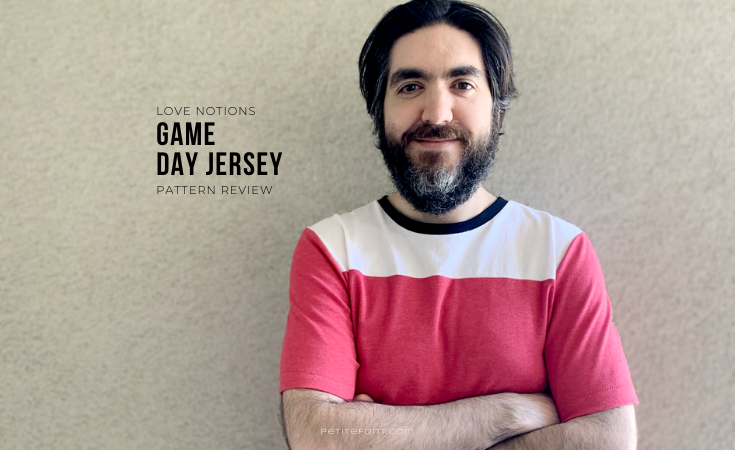 Ryan leaning against a stucco wall with his arms crossed over his chest. Black text overlay reads Love Notions Game Day Jersey Pattern Review