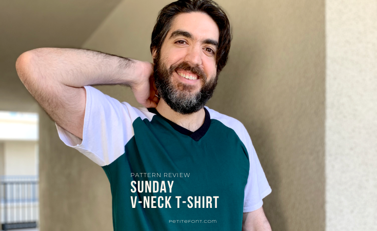 Dark haired man with a beard in a color blocked green and white t-shirt and light brown cargo shorts. He has a hand behind his neck and is smiling at the camera. White text overlay reads Pattern Review: Sunday V-neck T-shirt.