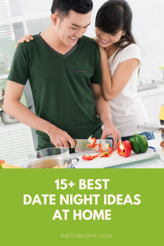 An Asian couple stands smiling at the counter chopping vegetables. The man in a dark green v-neck t-shirt holds the knife and the woman with her arms around him looking over his shoulder is wearing a white t-shirt. Text in a green box reads 15+ best at home date night ideas