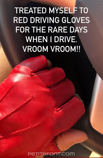 Picture of a red-gloved hand wrapped around a steering wheel with text overlay that reads "treated myself to red driving gloves for the rare days when I drive. Vroom vroom!!"